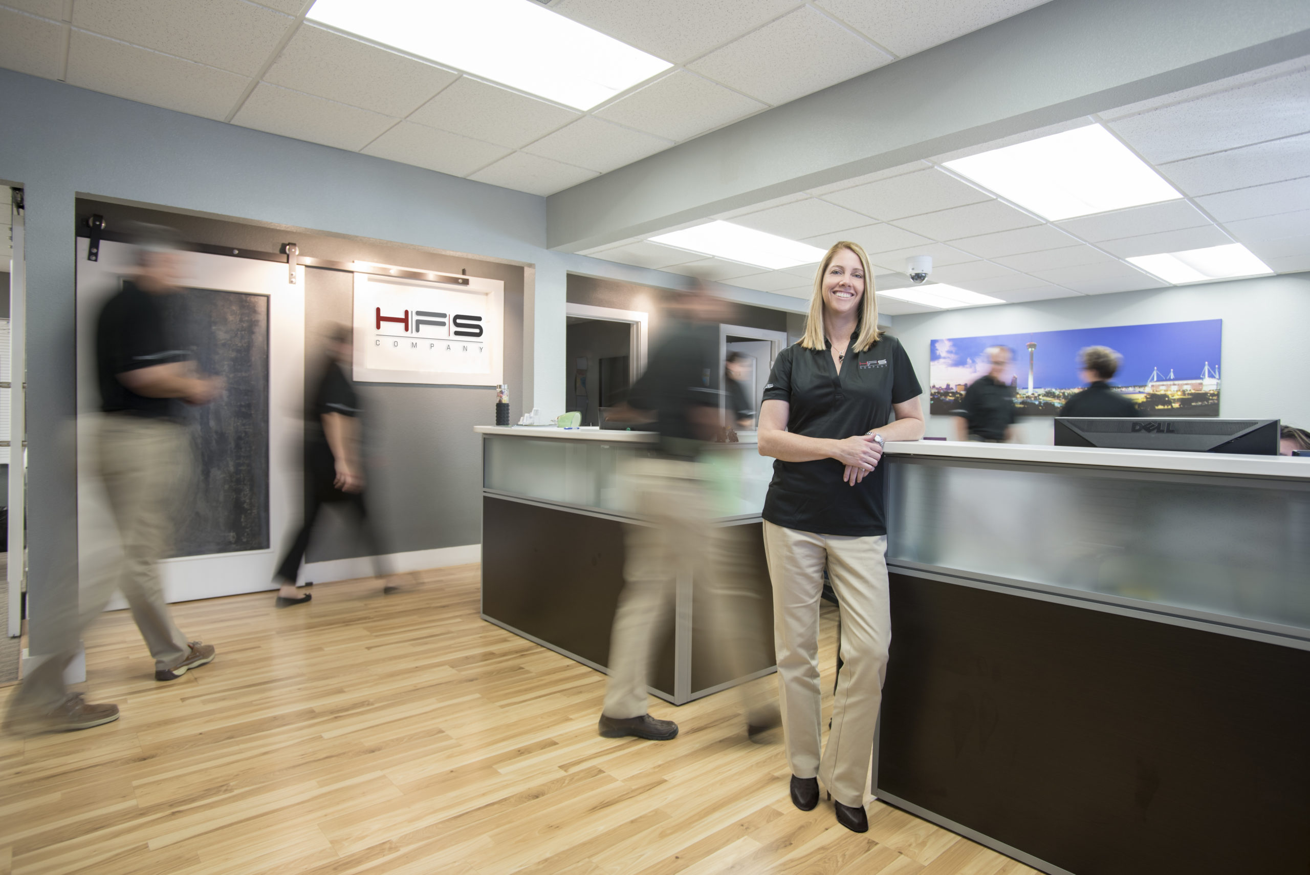 Michele Torres standing inside the HFS building